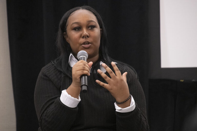 Emani Brooks speaking at the 2023 National Mentoring Summit hosted by MENTOR.